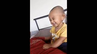 baby smiling gif
