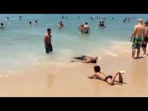 Shahir swimming in Ipenama beach, Rio de Janeiro, Brazil