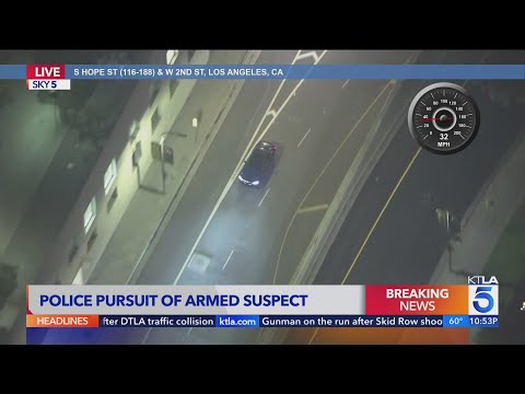 Officers chase armed suspects in L.A.