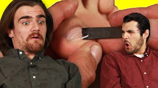 Guys Get Their Dead Foot Skin Scraped Off