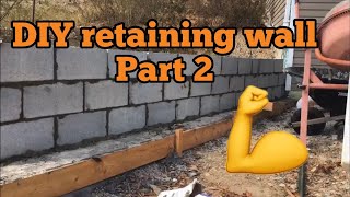DIY laying concrete block for retaining wall