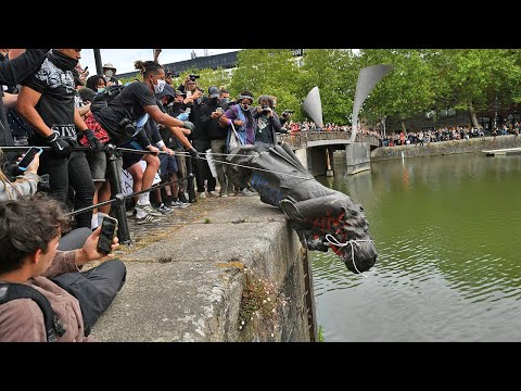 Slave trader statue thrown into river in Bristol during protests