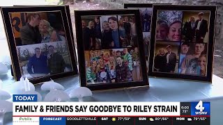 Family and friends say goodbye to Riley Strain