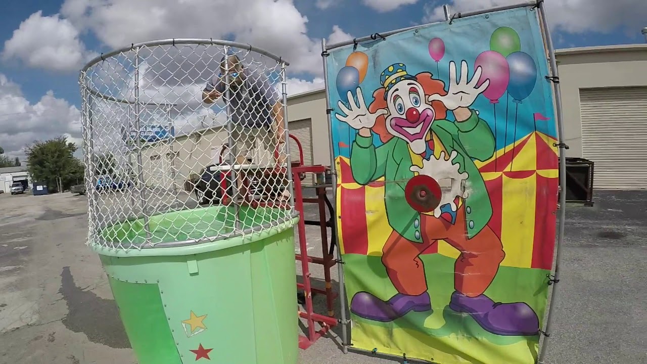 Surprise  Dunk tank challenge at Afford A Bounce