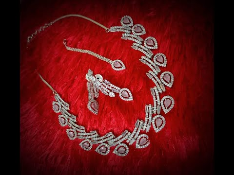 Artificial diamonds american diamond pendant set, packaging ...