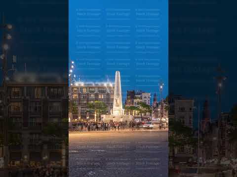 The Dam square in Amsterdam day to night timelapse, The Netherlands.