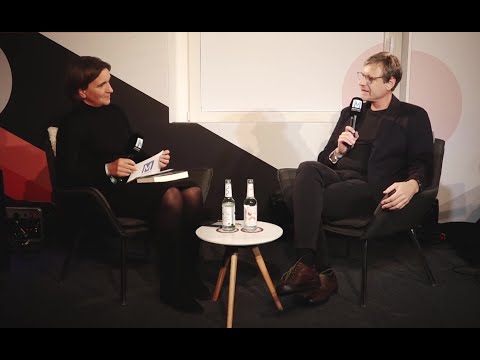 Medientage München: Meike Gebhard (Utopia) interviewt David Goeßmann zu Kurs Klimakollaps