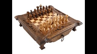 Деревянные резные шахматы в ларце с ящиками