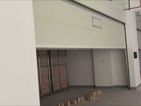 Searching for High-Performance Doors for Your Factory?----Xufeng Wing Panel Sectional Doors