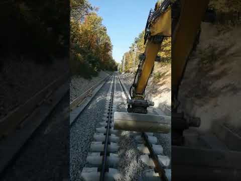 Trať Olomouc - Šumperk úsek Libina - Hrabišín první jízda po nových kolejích Liebherr 922 ZW