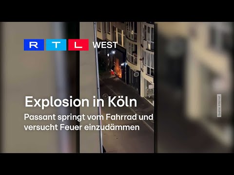 Explosion in Köln: Passant springt vom Fahrrad und versucht Feuer einzudämmen | RTL WEST, 18.09.2024