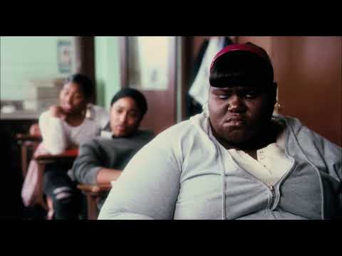 Precious (2009) trailer frame — Claireece 'Precious' Jones walking against Harlem winter light