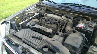 1999 Mazda Protege 1.6L engine Spark Plug and Spark Plug Boot Replacement