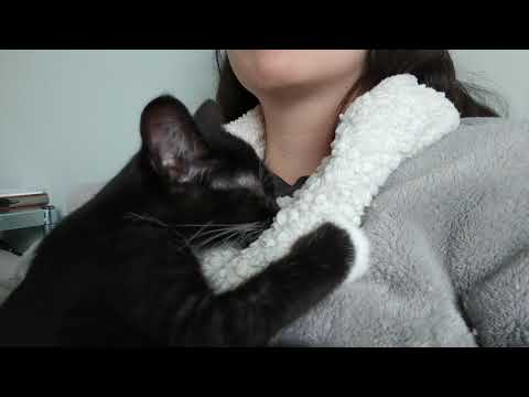 Jaina suckling on my robe