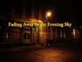 fading away in the evening sky