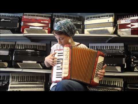 1384 - Red Hohner Concerto IM MM 48 $795