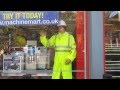 Mechanical waving mannequin man at the 2014 London Marathon at the Docklands Machine Mart Store Mechanical waving mannequin man at the 2014 London Marathon at the Docklands Machine Mart Store