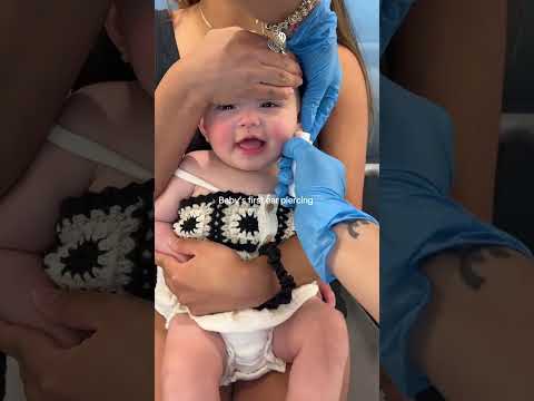 Baby's first ear piercing, The little smile before ❤️ momlife heart full ❣️ #momlifeheartfull