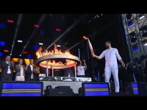 Video Thumbnail: Olympic torch arrives at Place de la République in Paris | AFP