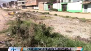 preview picture of video 'CALLES ABANDONADAS Y LLENAS DE BASURA EN EL TAMBO'