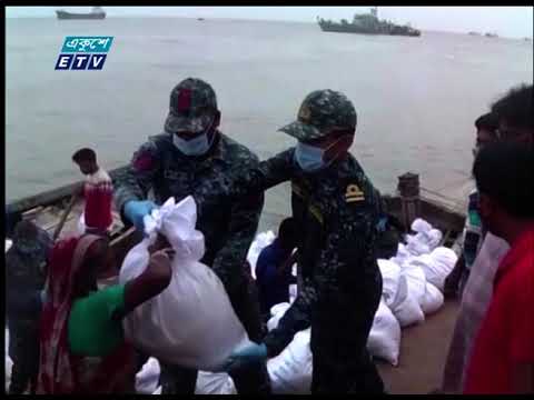 দুঃস্থদের মাঝে ত্রাণ বিতরণ করেছে বাংলাদেশ নৌবাহিনী