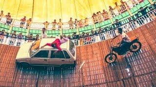 Vehicles Ride At High Speed On Walls In The &quot;Well Of Death&quot;