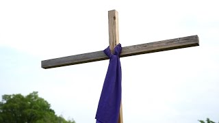 Good Friday cross-raising
