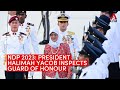 National Day Parade 2023: President Halimah Yacob inspects guard of honour