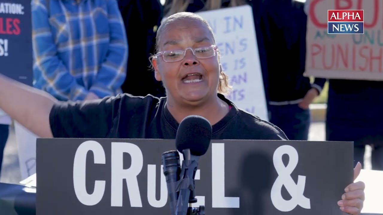 Former inmate Jayme Ali leads a protest outside Shakopee women's prison against transgender policy