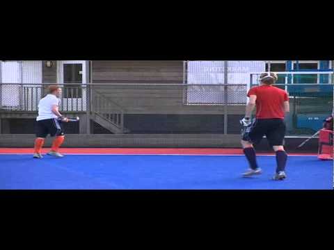 2. Strafcorner: schuifslag hoog van aangever - geen doelpunt