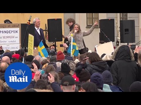 Hundreds gather to protest against Covid restrictions in Stockholm