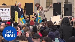 Hundreds gather to protest against Covid restrictions in Stockholm