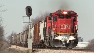preview picture of video 'CN 2106 East (GE C40-8) Approaching Genoa, Illinois on 3-22-2013'