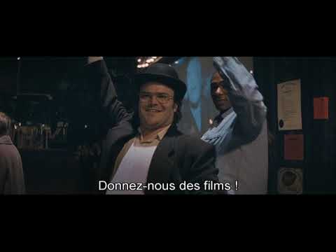 International trailer moment: outdoor community screening is set up on the street