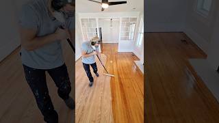 Restoring original hardwood floors by sanding and applying polyurethane (applicator link in bio)