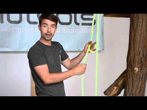 Seil, Ring und Schmetterlingsknoten.