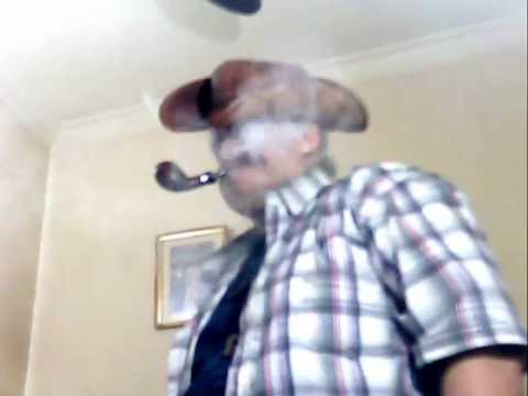 Cowboy, with Dark Blue TShirt, Scotland Shirt, Smoker, of Stanwell, Viking; Pipe Tobaccos