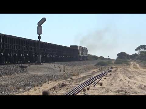 Empty Karara  Mining iron ore train with crew change at NOLA, then heads out for GERALDTON.