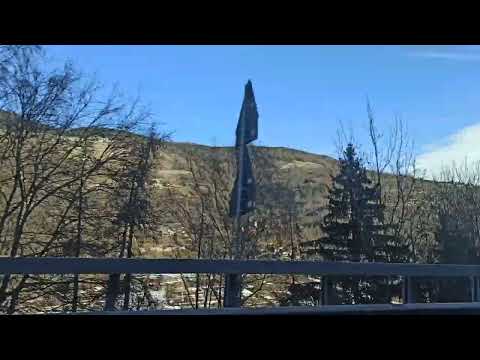 Driving southbound from Etroubles I, view towards Allein, Aosta valley, Italy, 23/12/21