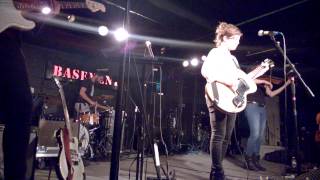 Mirah performing at the Basement