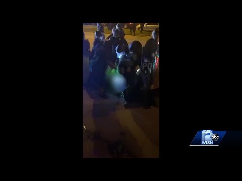 Person hit by car after clash with officers outside police station