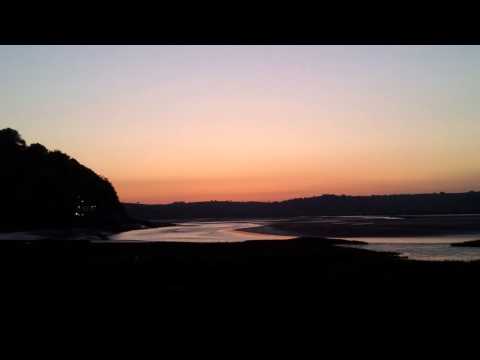 [Link 1] Laugharne- Sun rising above the Boathouse. Video