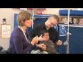 Child with Traumatic Brain Injury Stands with "Proud Talk" 