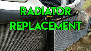 How to replace a radiator on a 2001 Dodge Caravan