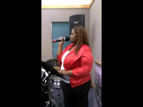 Yolanda singing "I believe in you and me"