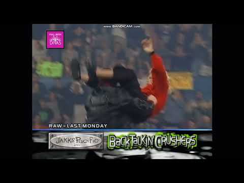 Bubba Ray Dudley powerbombs Mae Young through table