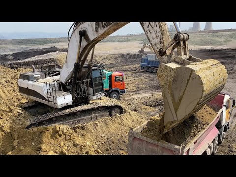 Caterpillar 375 Excavator Loading Mercedes & MAN Trucks