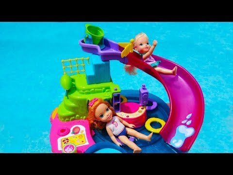 Elsa and Anna toddlers at the water park