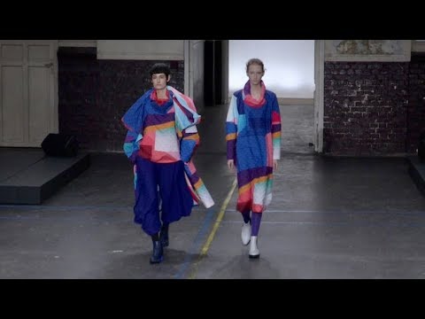 Models and designer on the runway for the Issey Miyake Fashion Show in Paris