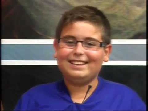 Boy can't hold back his laughter during the rosary prayer live (Original video)